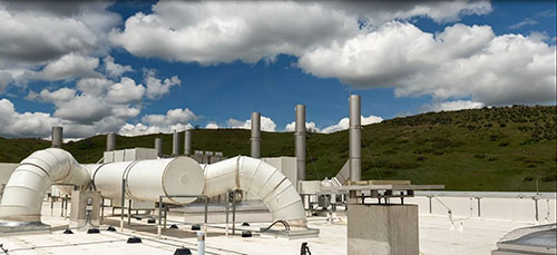 Photo of a rooftop exhaust system.